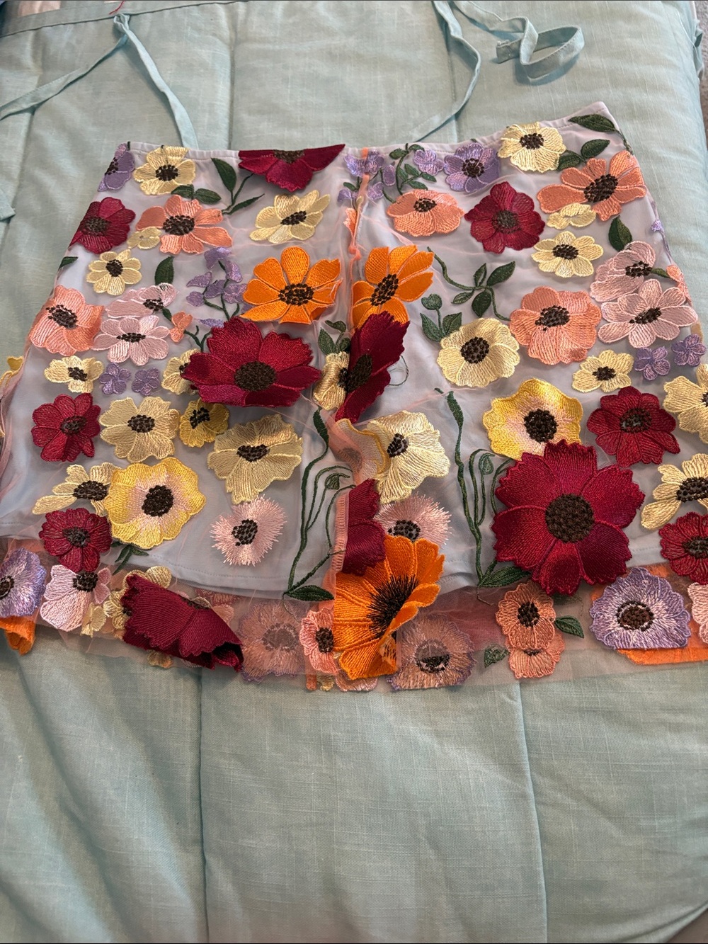 Floral Embroidered Women’s mini skirt 34” w 16 1/2” top 2 bottom zip part